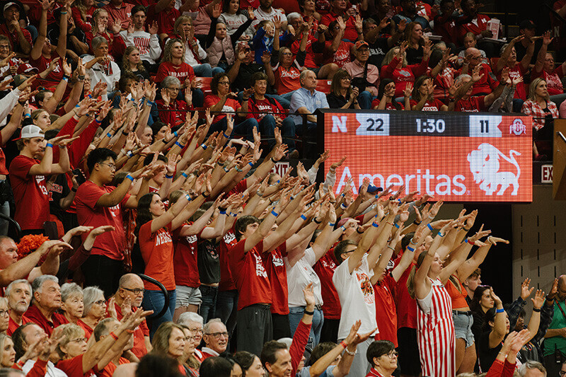 Energetic Husker fans yell in support of their favorite volleyball team!